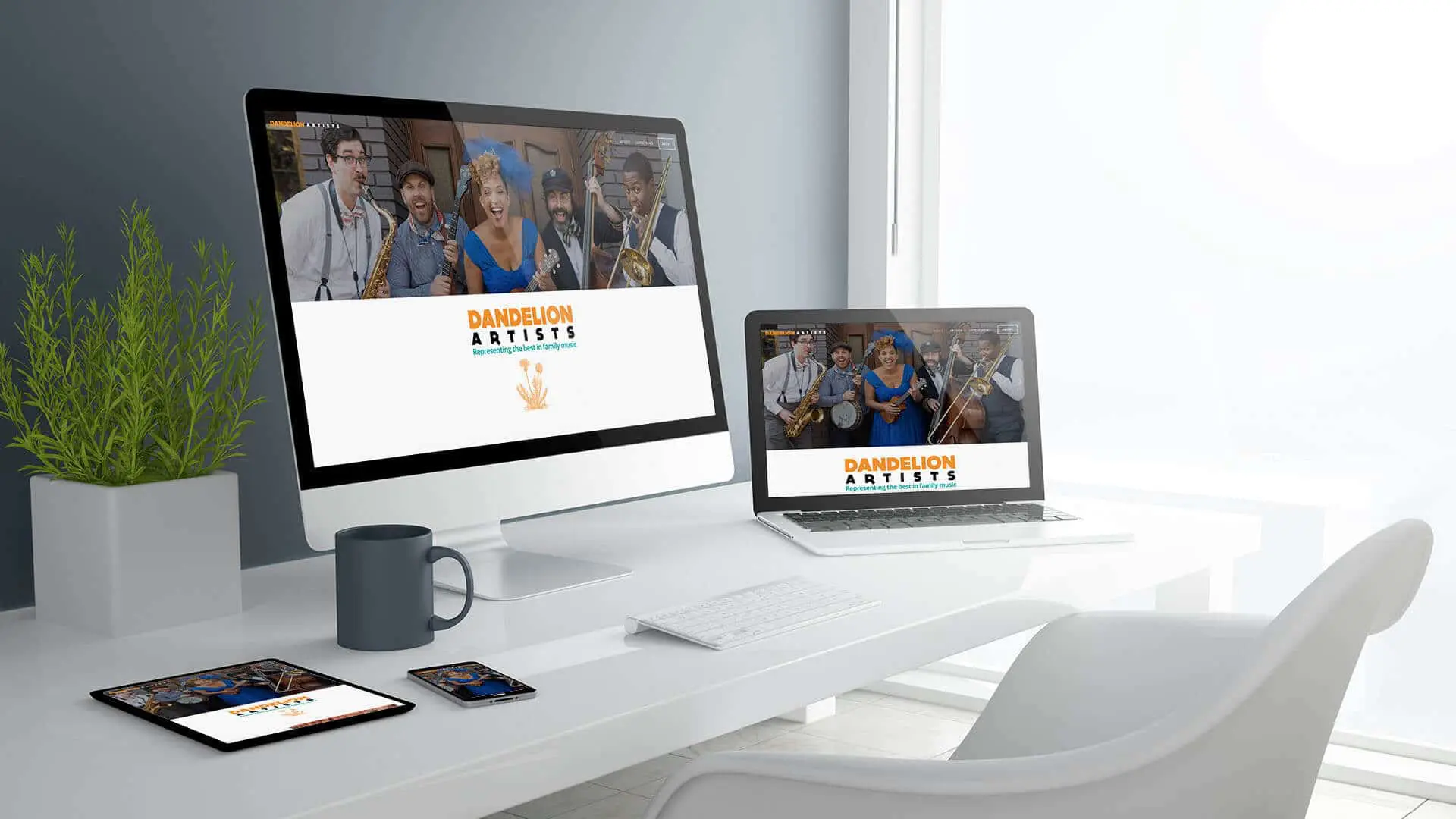 Dandelion Artists responsive website by Guedin Designs displayed on large monitor, laptop, tablet, and phone.